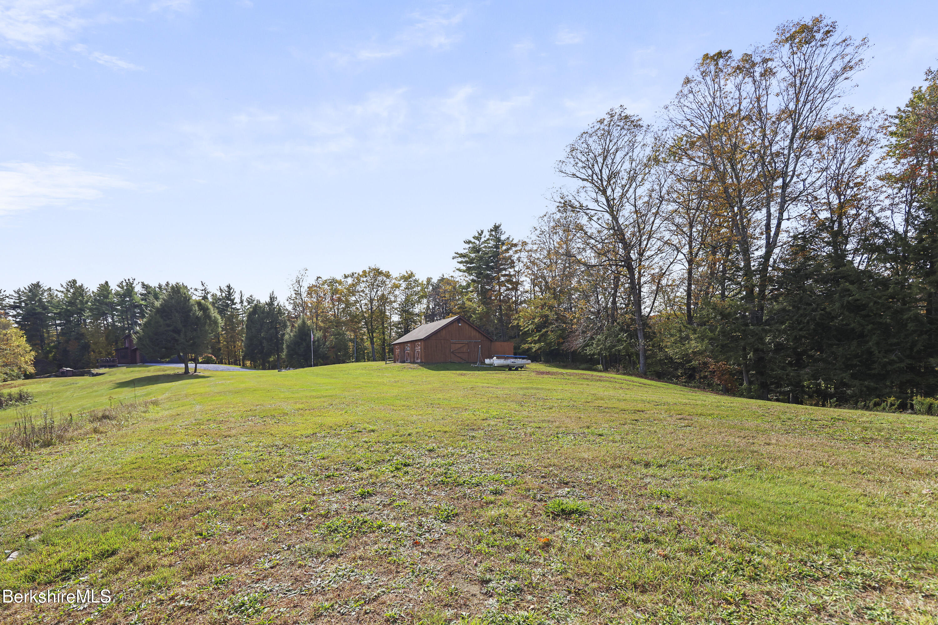 1020 Cascade Street Pittsfield, MA 01201 - Photo 56 of 75 a big yard with trees in the background