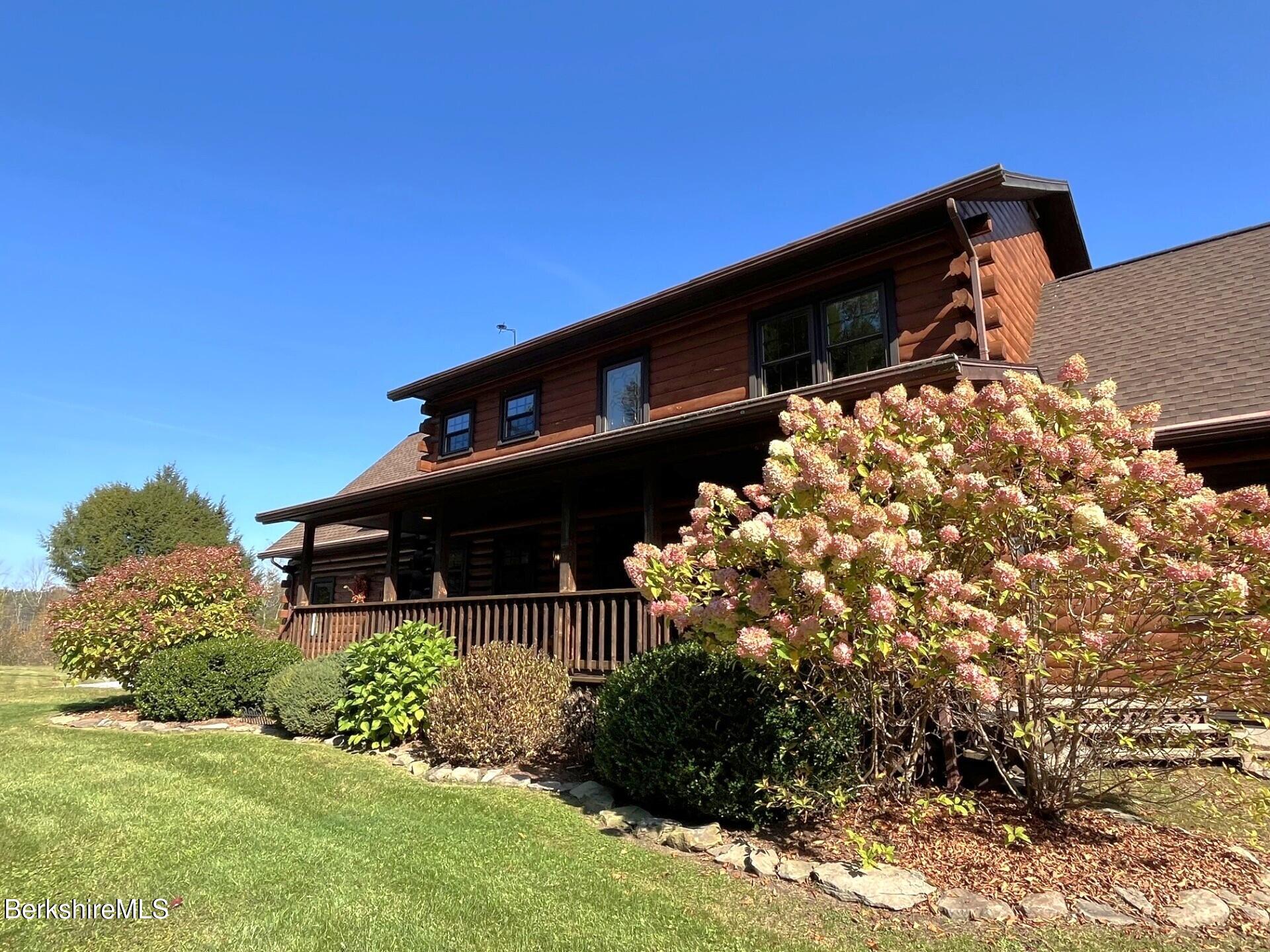 1020 Cascade Street Pittsfield, MA 01201 - Photo 6 of 75 a front view of a house with a yard