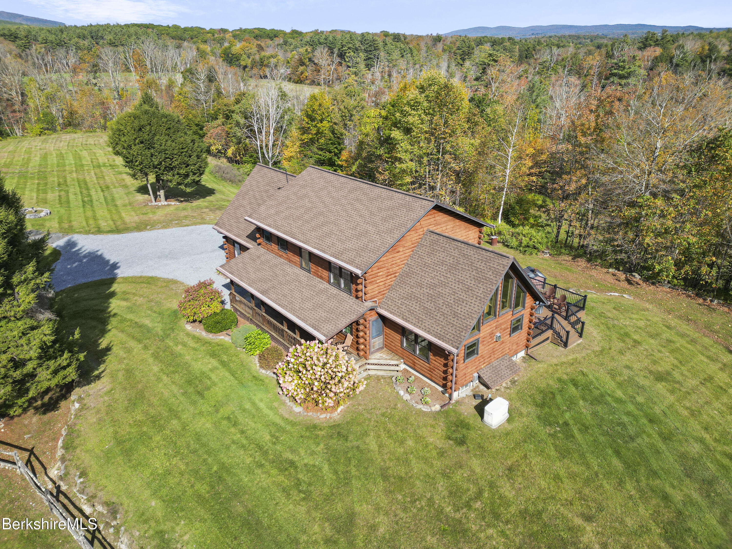 1020 Cascade Street Pittsfield, MA 01201 - Photo 61 of 75 an aerial view of a house with a yard swimming pool outdoor seating and yard