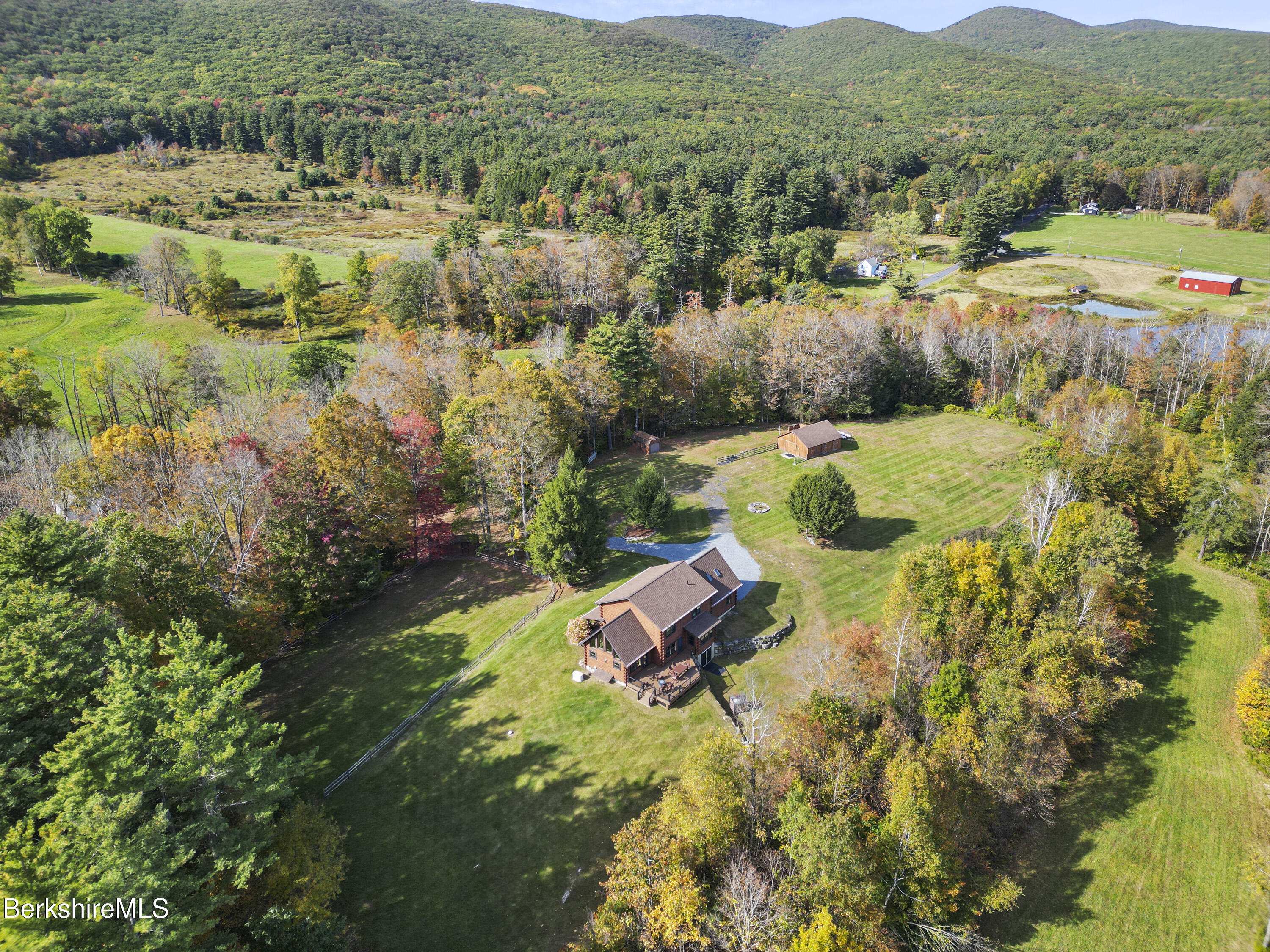 1020 Cascade Street Pittsfield, MA 01201 - Photo 63 of 75 an aerial view of residential house with outdoor space and mountain view in back