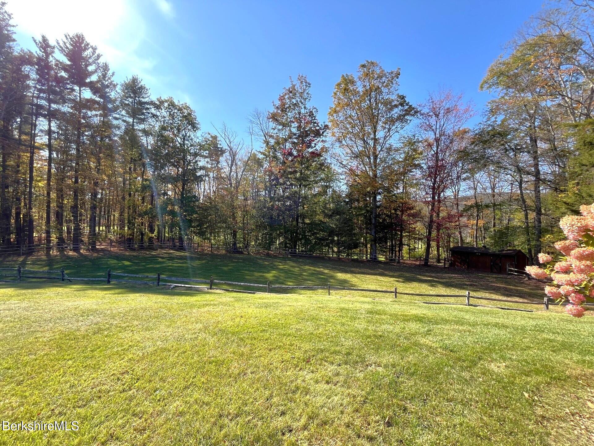 1020 Cascade Street Pittsfield, MA 01201 - Photo 66 of 75 a view of a swimming pool with an outdoor space and seating area