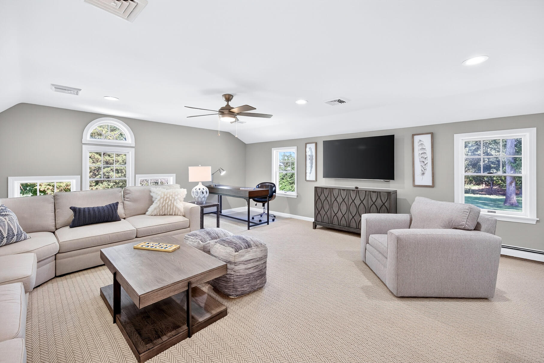 12 Paddocks Path East Dennis, MA 02638 - Photo 46 of 64 a living room with furniture and a flat screen tv