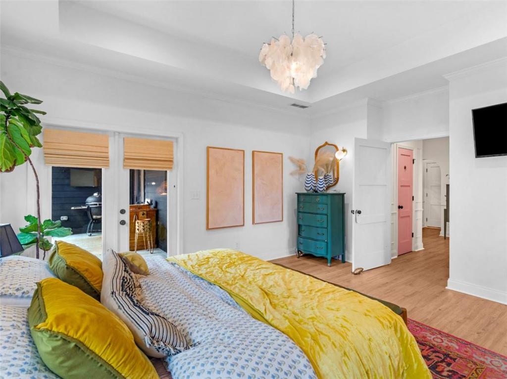 701 Marks Road Mansfield, GA 30055 - Photo 18 of 50 a bedroom with a bed dresser and a flat screen tv