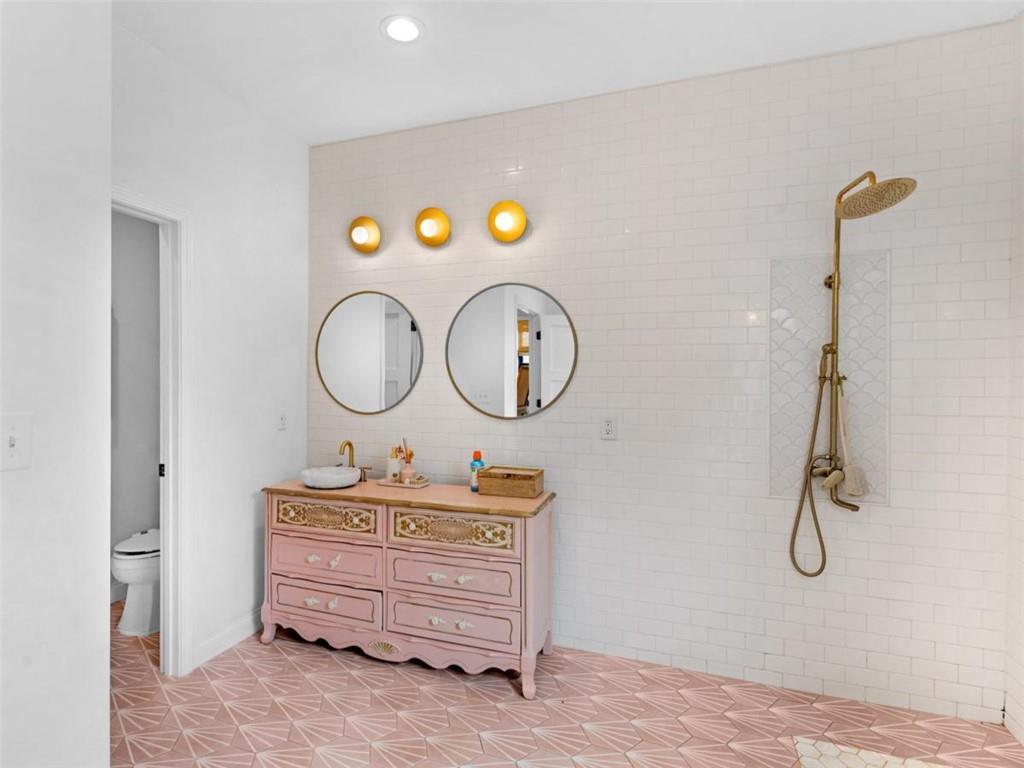 701 Marks Road Mansfield, GA 30055 - Photo 21 of 50 a bathroom with a sink mirror and vanity