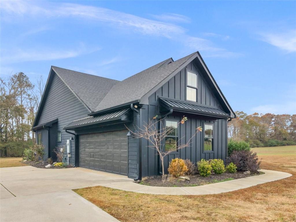701 Marks Road Mansfield, GA 30055 - Photo 3 of 50 a front view of a house with a yard