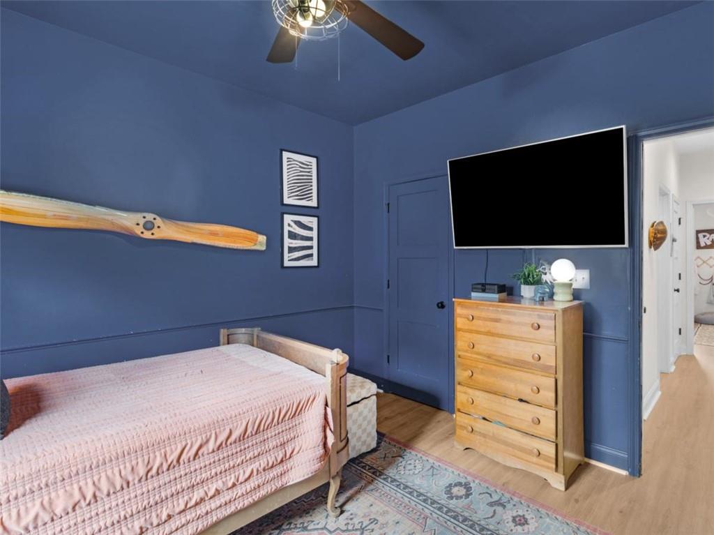 701 Marks Road Mansfield, GA 30055 - Photo 33 of 50 a bedroom with a bed and a flat screen tv