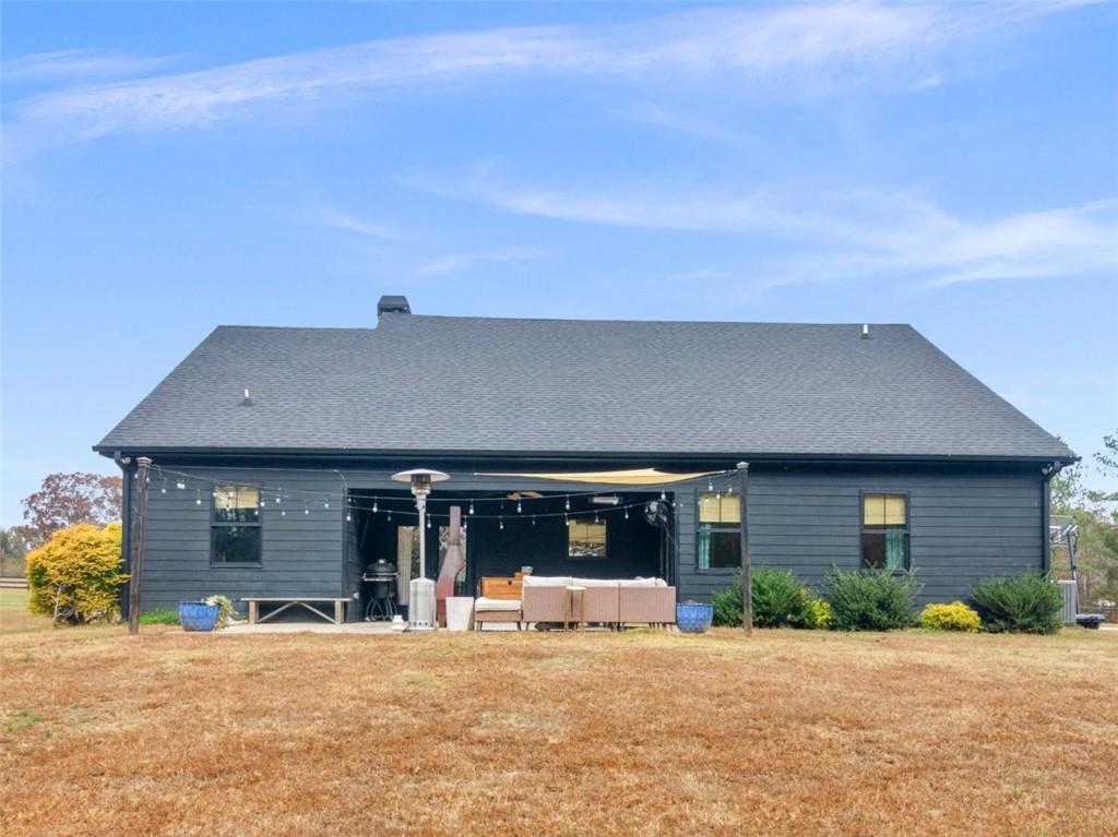 701 Marks Road Mansfield, GA 30055 - Photo 41 of 50 a front view of a house with a yard and garage
