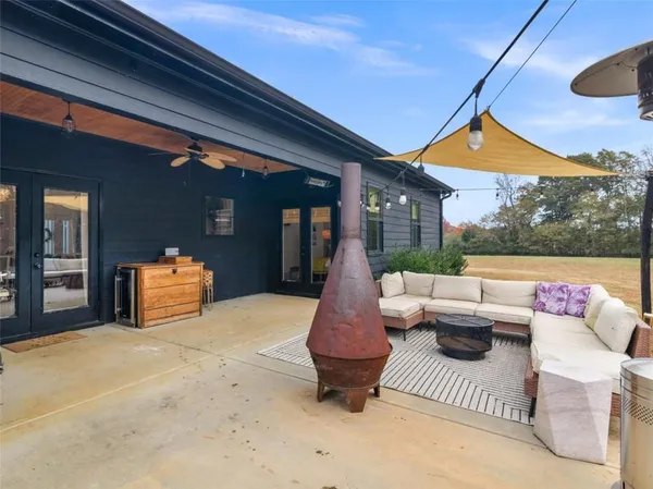 a view of a couches on the roof deck
