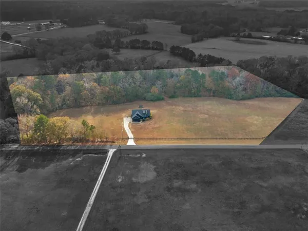 a view of a swimming pool and lake