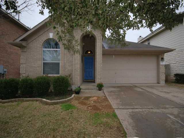 3521 Bratton Ridge Crossing Austin, TX 78728 - Photo 1 of 1 a front view of a house with garden