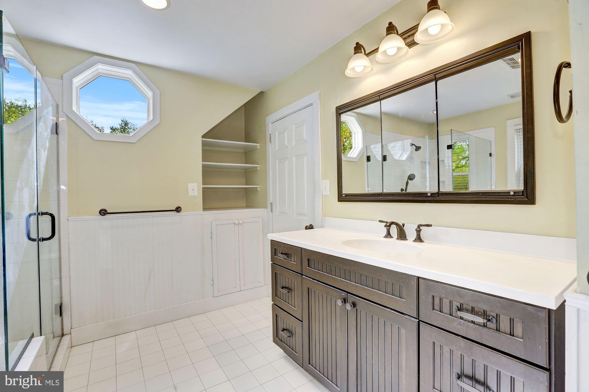 1105 Dryden Street Silver Spring, MD 20901 - Photo 33 of 48 Built in shelves for a no clutter counter!