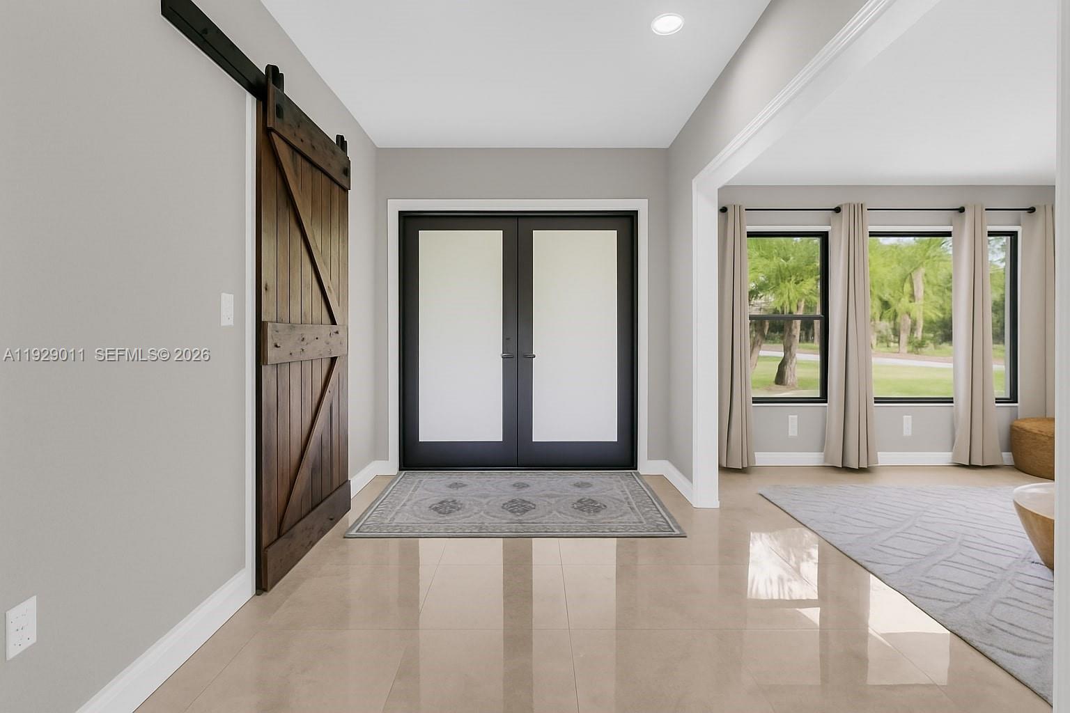 16900 Southwest 276th Street Homestead, FL 33031 - Photo 6 of 22 a view of entryway with window
