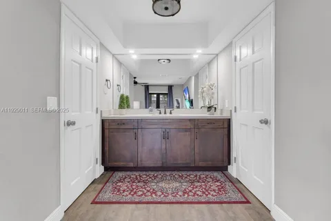 a bathroom with a shower and toilet