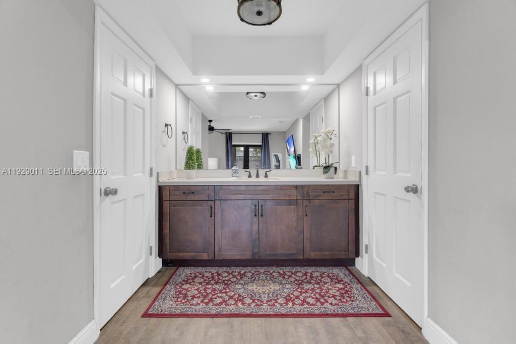 16900 Southwest 276th Street Homestead, FL 33031 - Photo 10 of 22 a bathroom with a sink a vanity and a mirror