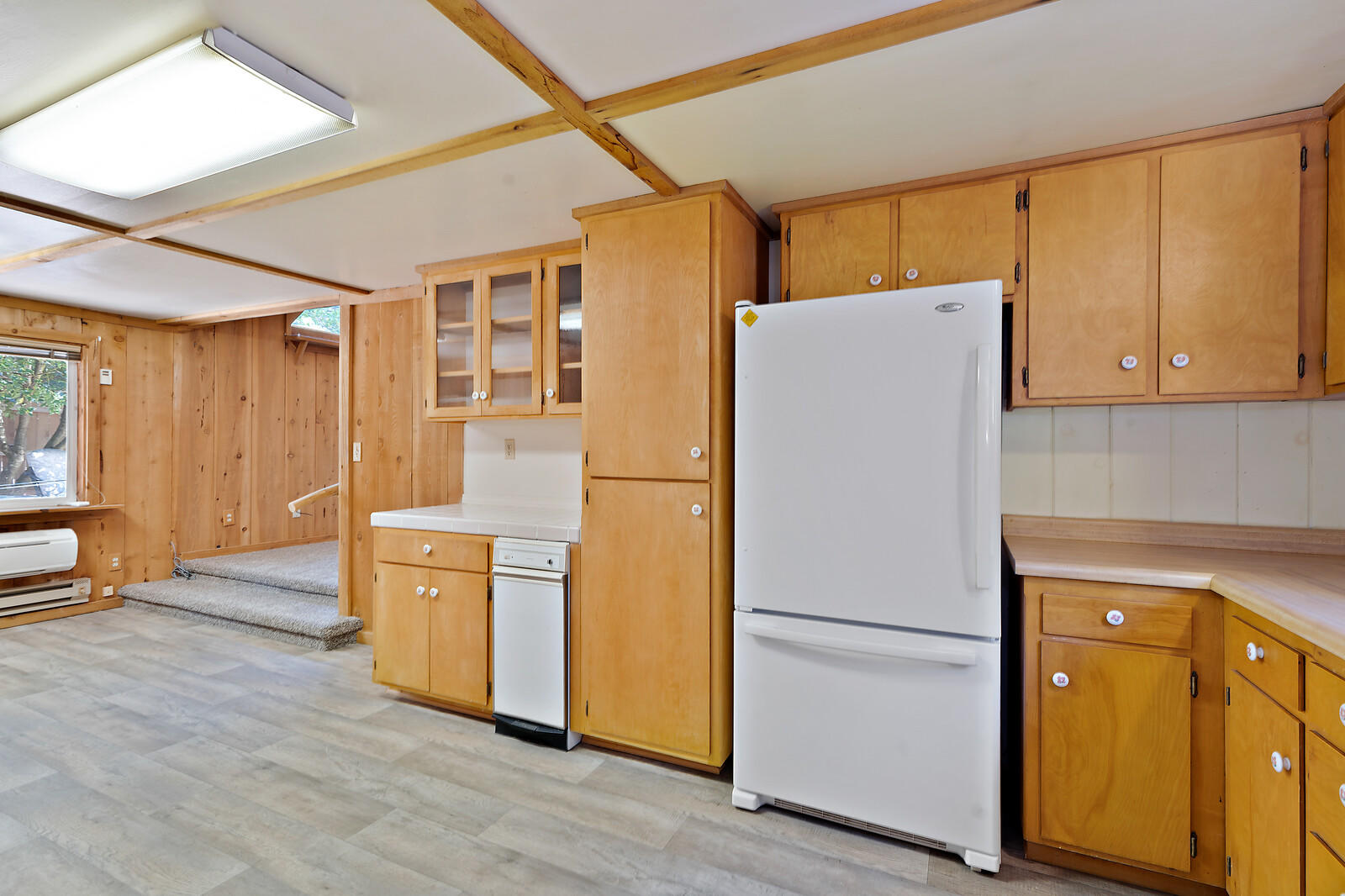 3990 Galice Road Merlin, OR 97532 - Photo 9 of 43 a white refrigerator freezer and a stove sitting inside of a kitchen