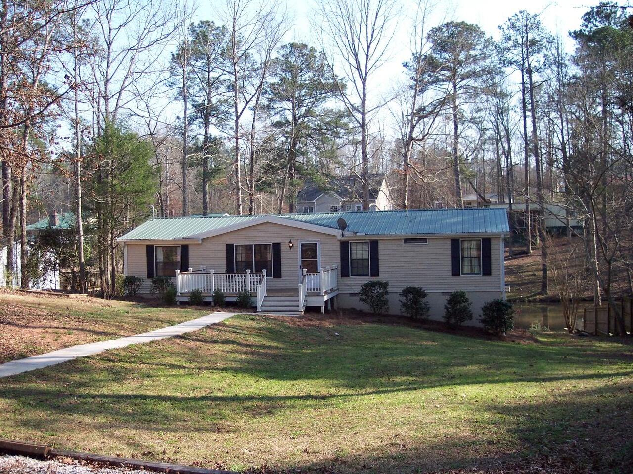 344 Haley Road Jackson, GA 30233 - Photo 1 of 1 a front view of a house with garden