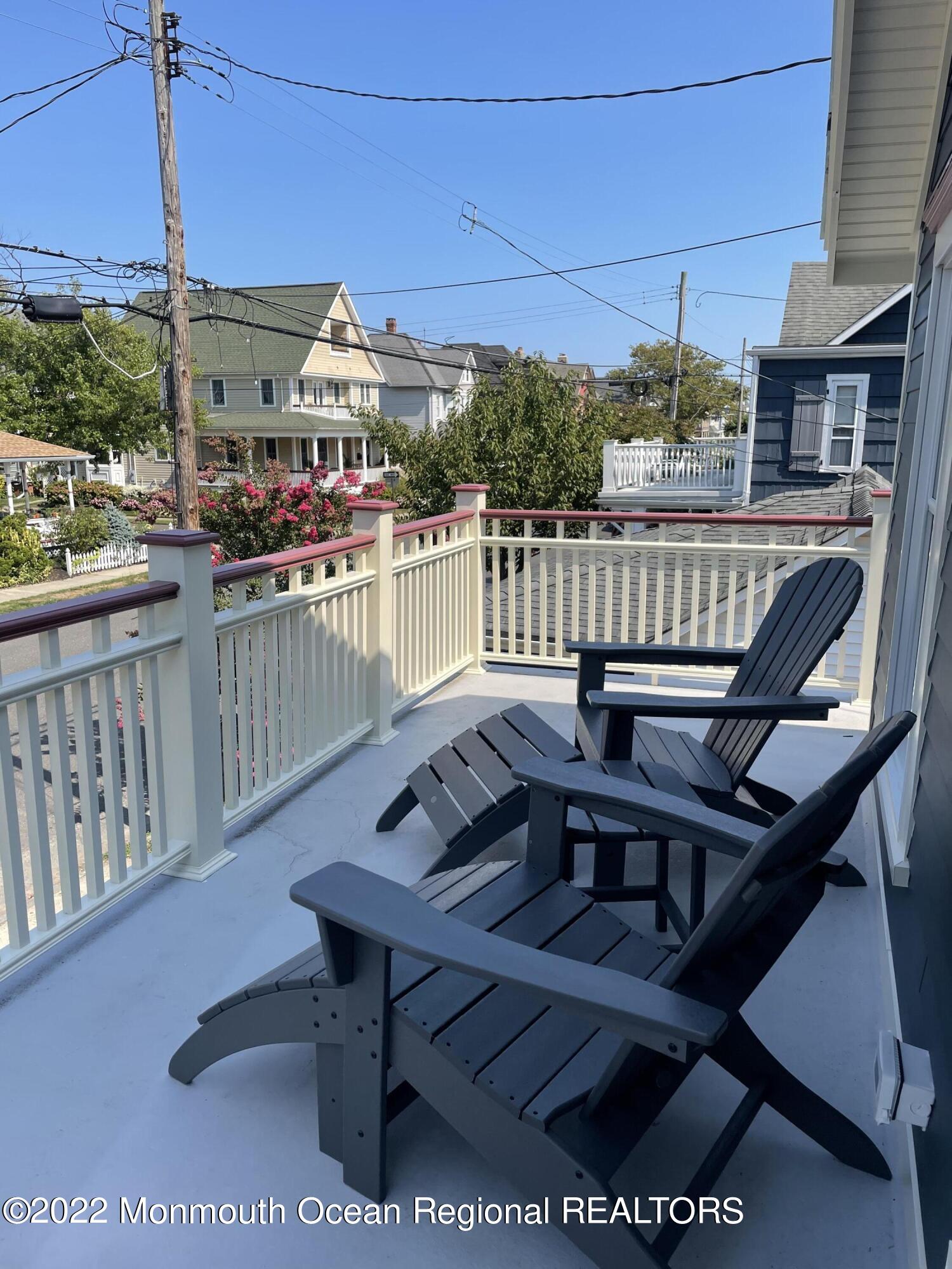 64 Abbott Avenue Ocean Grove, NJ 07756 - Photo 16 of 19 a view of a balcony with chairs