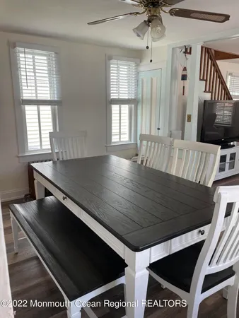 a view of kitchen with furniture and window