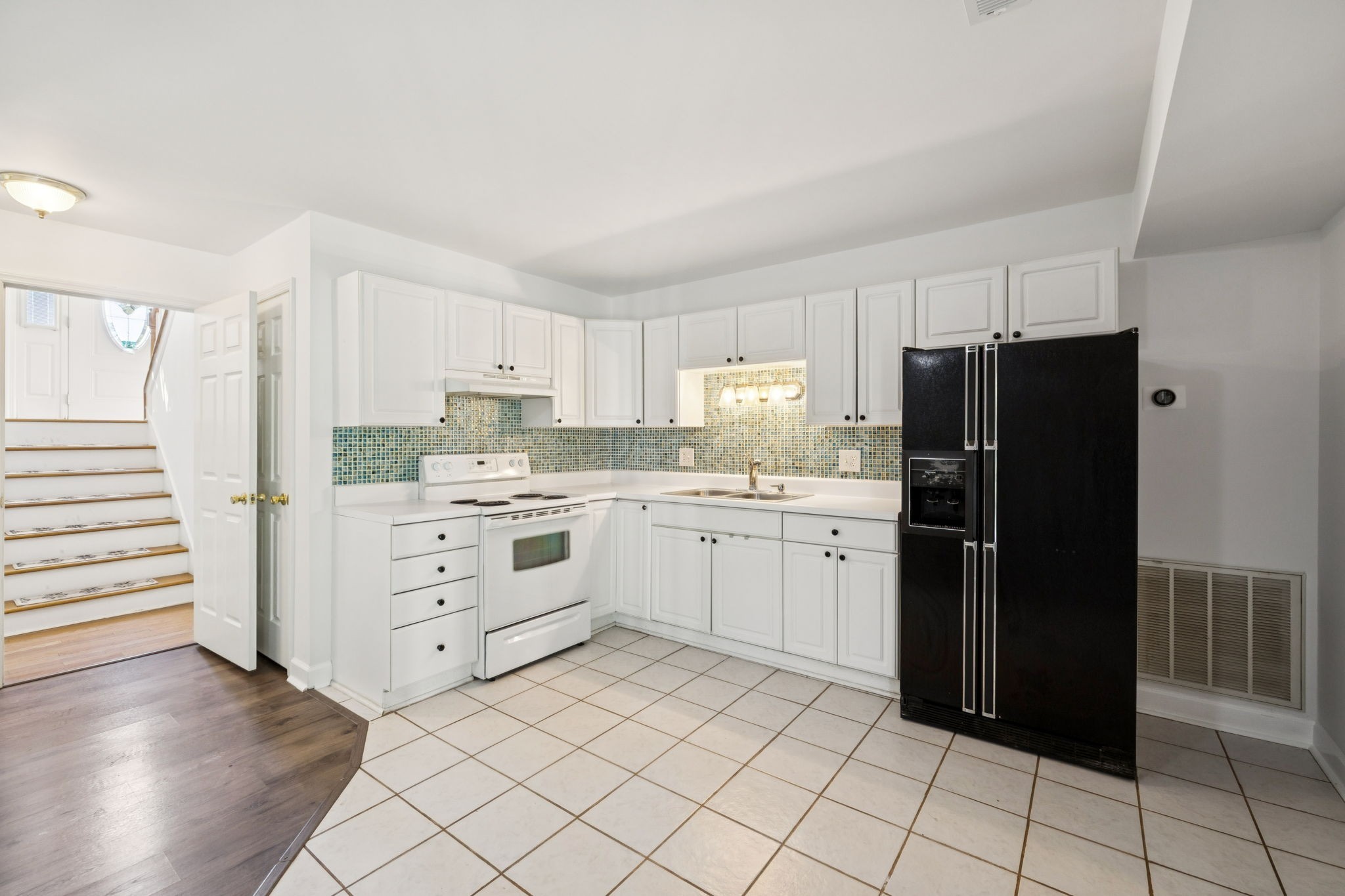 3679 Old State Highway 11 Springfield, TN 37172 - Photo 29 of 50 a kitchen with a refrigerator and cabinets
