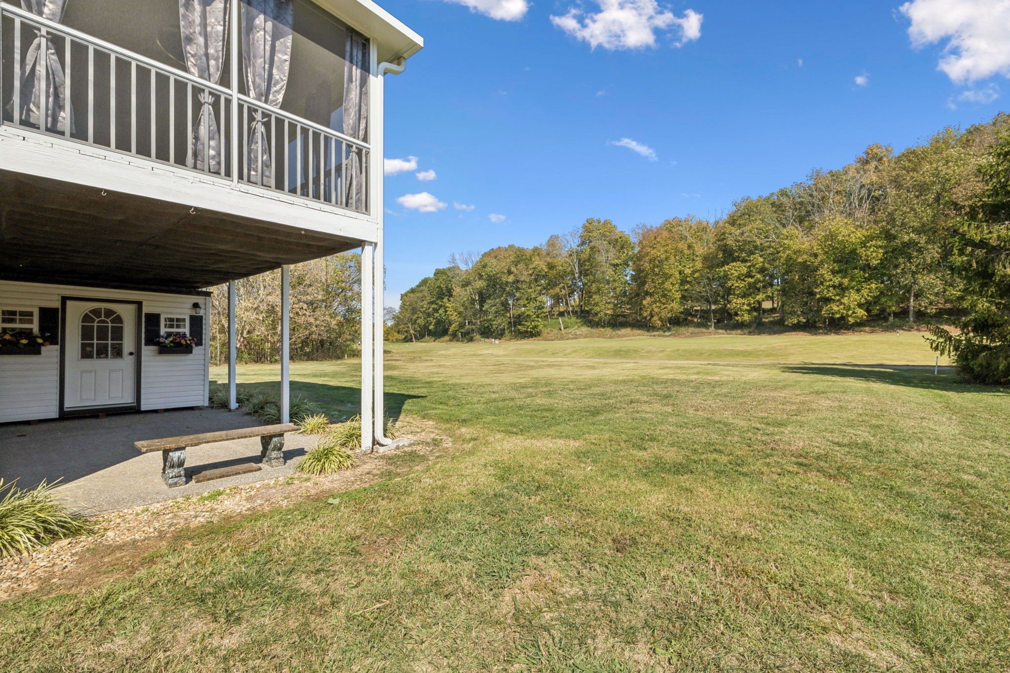 3679 Old State Highway 11 Springfield, TN 37172 - Photo 39 of 50 a view of a house with backyard porch and sitting area