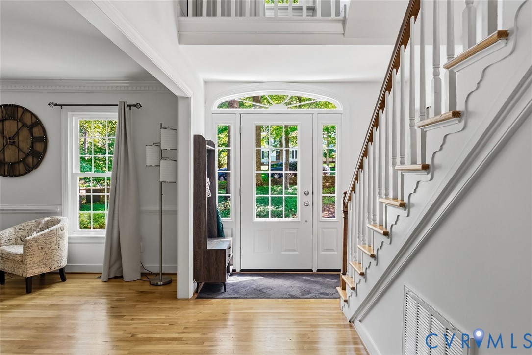14321 Crossings Ridge Drive Midlothian, VA 23113 - Photo 5 of 43 a view of an entryway with a floor to ceiling window and interior