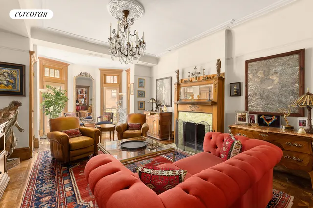 a living room with furniture large windows and flat screen tv
