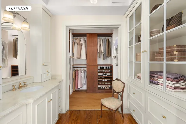 a bathroom with a tub and a window