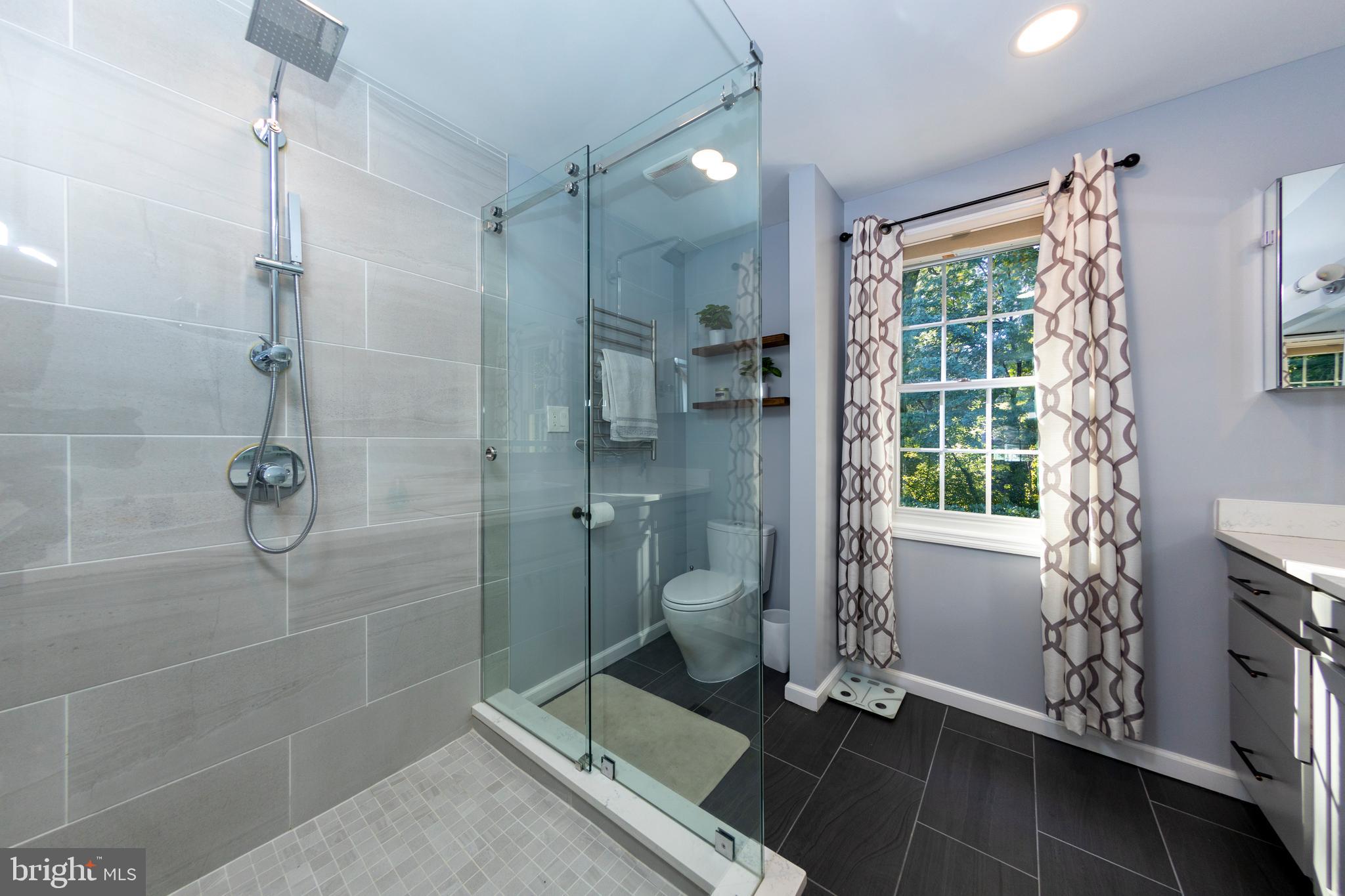 2513 Farrier Lane Reston, VA 20191 - Photo 25 of 51 Custom Rain Head Glass Shower with Glass Barn Door