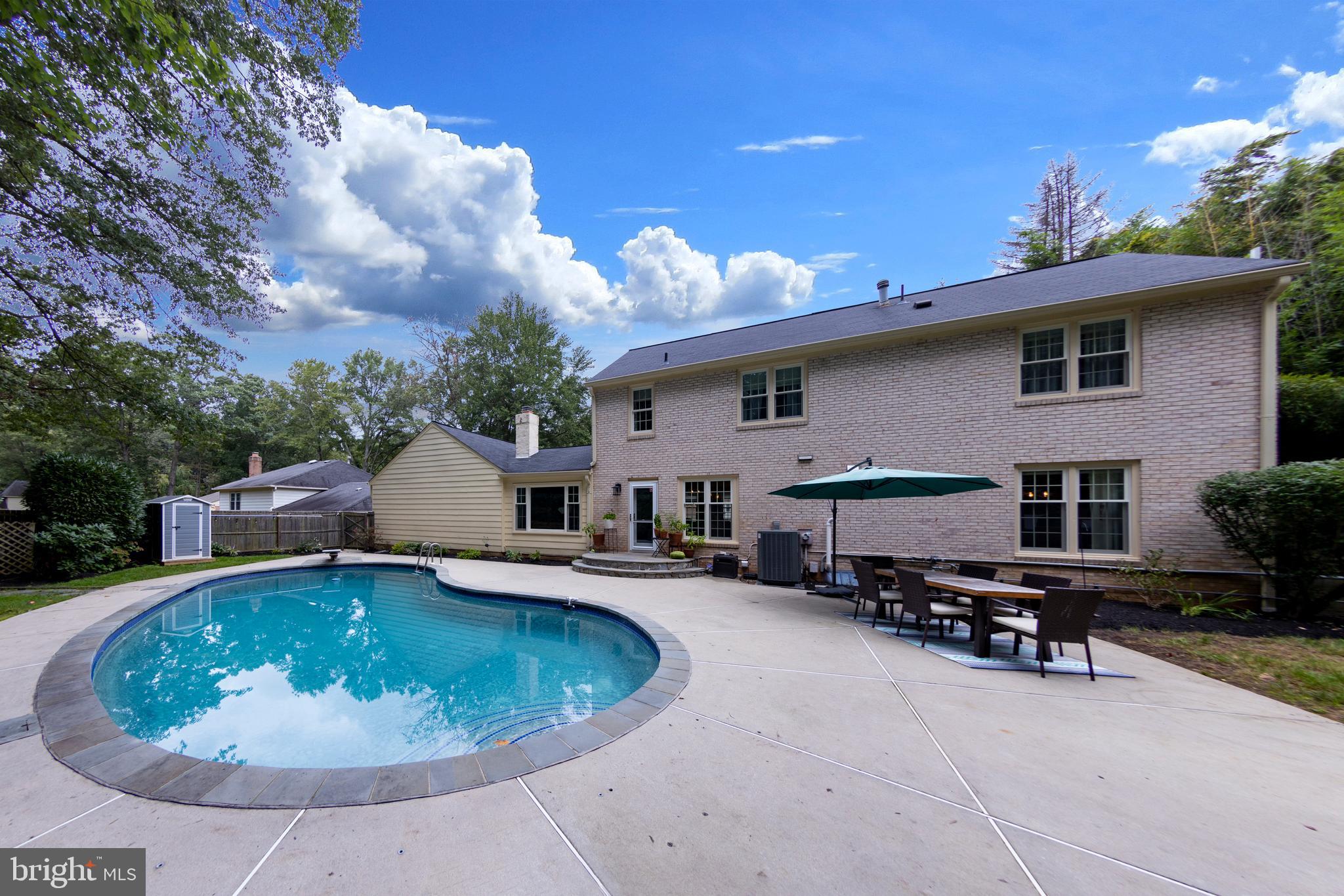 2513 Farrier Lane Reston, VA 20191 - Photo 41 of 51 Updated Stone on back stoop and around pool