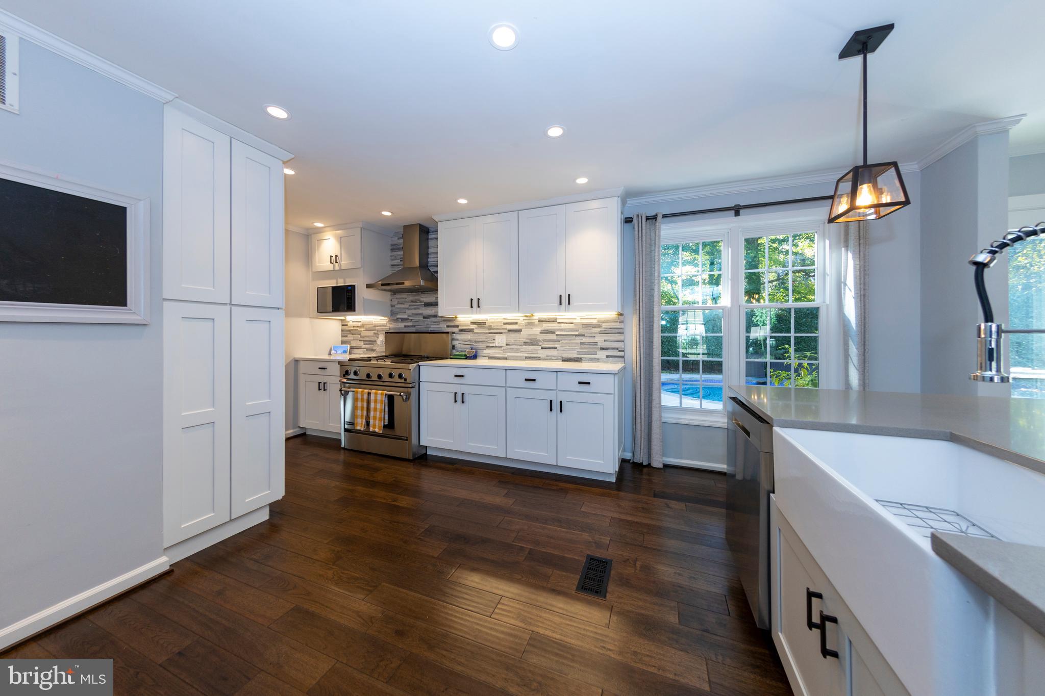 2513 Farrier Lane Reston, VA 20191 - Photo 7 of 51 Quartz Countertops, Custom Soft Closing Cabinetry