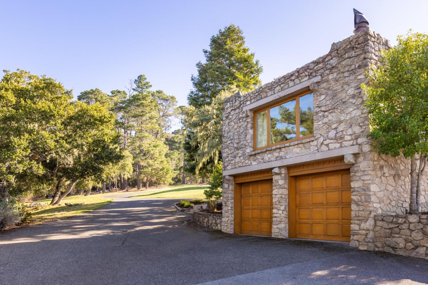 72 Fern Canyon Road Carmel, CA 93923 - Photo 58 of 66 a yellow house with trees in front of it