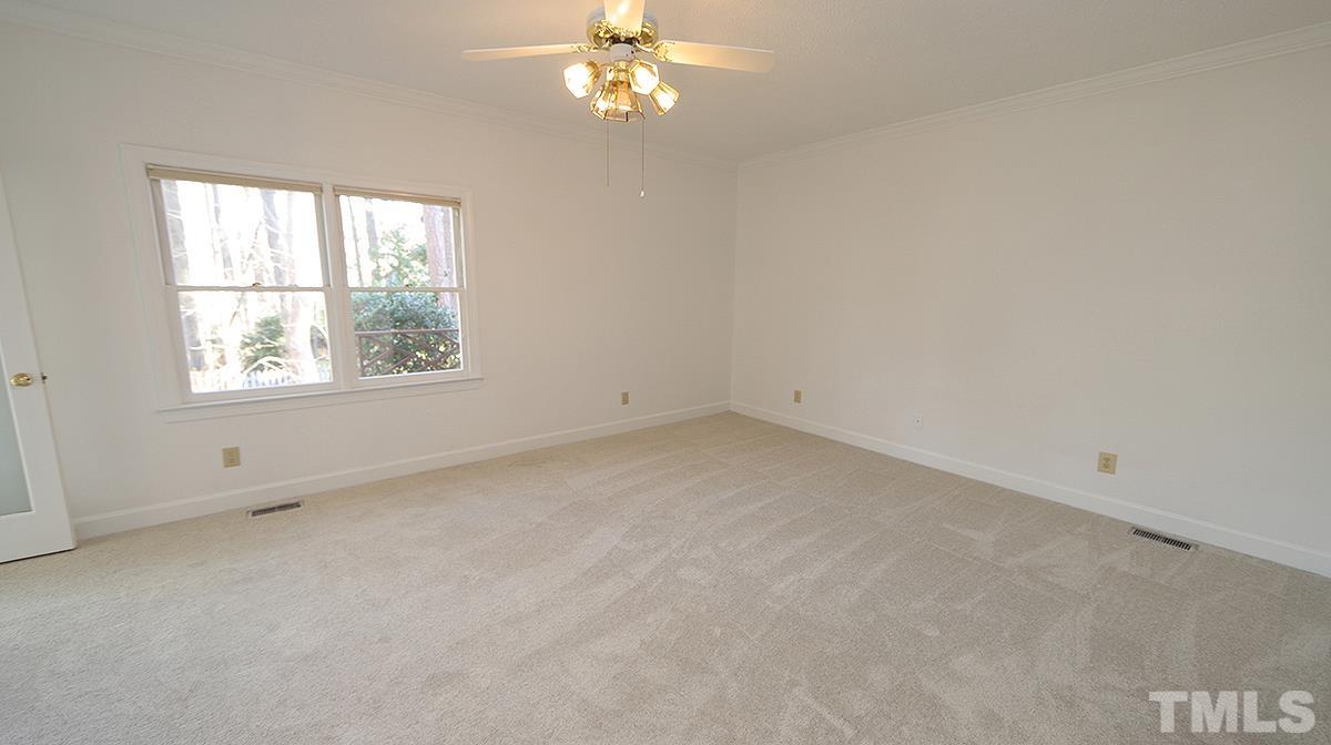 7949 Footman Way Raleigh, NC 27615 - Photo 15 of 28 an empty room with a window
