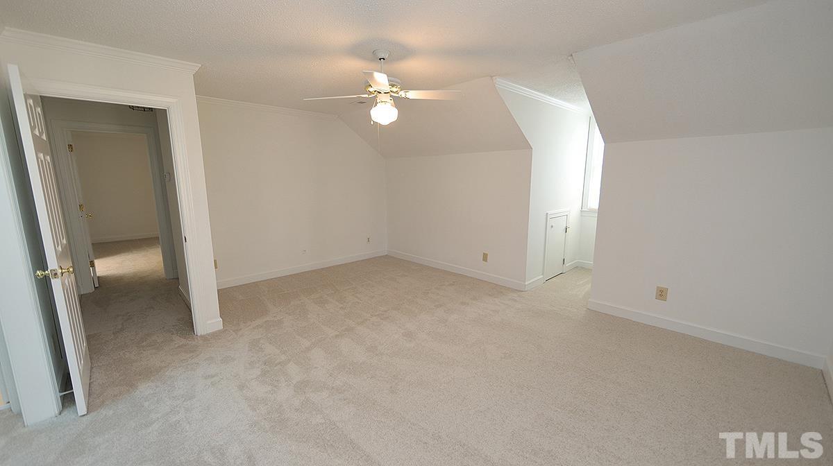 7949 Footman Way Raleigh, NC 27615 - Photo 22 of 28 an empty room with a bathroom