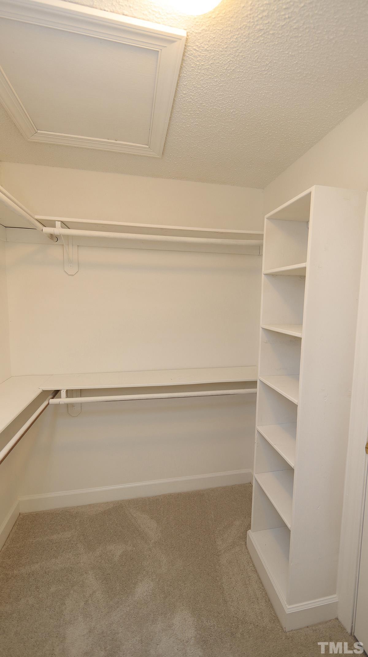 7949 Footman Way Raleigh, NC 27615 - Photo 25 of 28 a view of an empty walk in closet