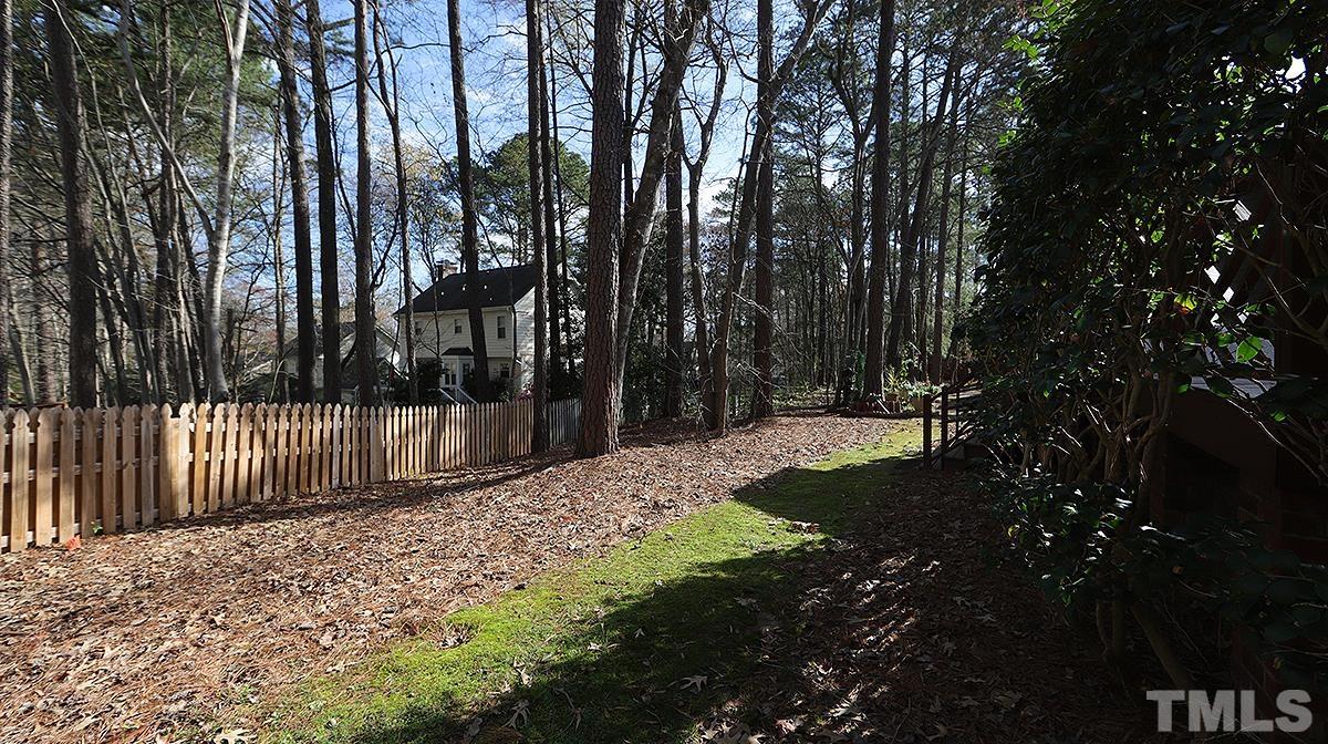 7949 Footman Way Raleigh, NC 27615 - Photo 27 of 28 a view of backyard with tree
