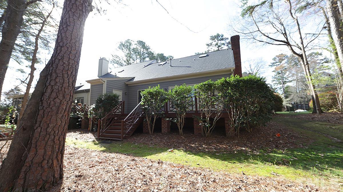 7949 Footman Way Raleigh, NC 27615 - Photo 28 of 28 a view of a porch with a tree