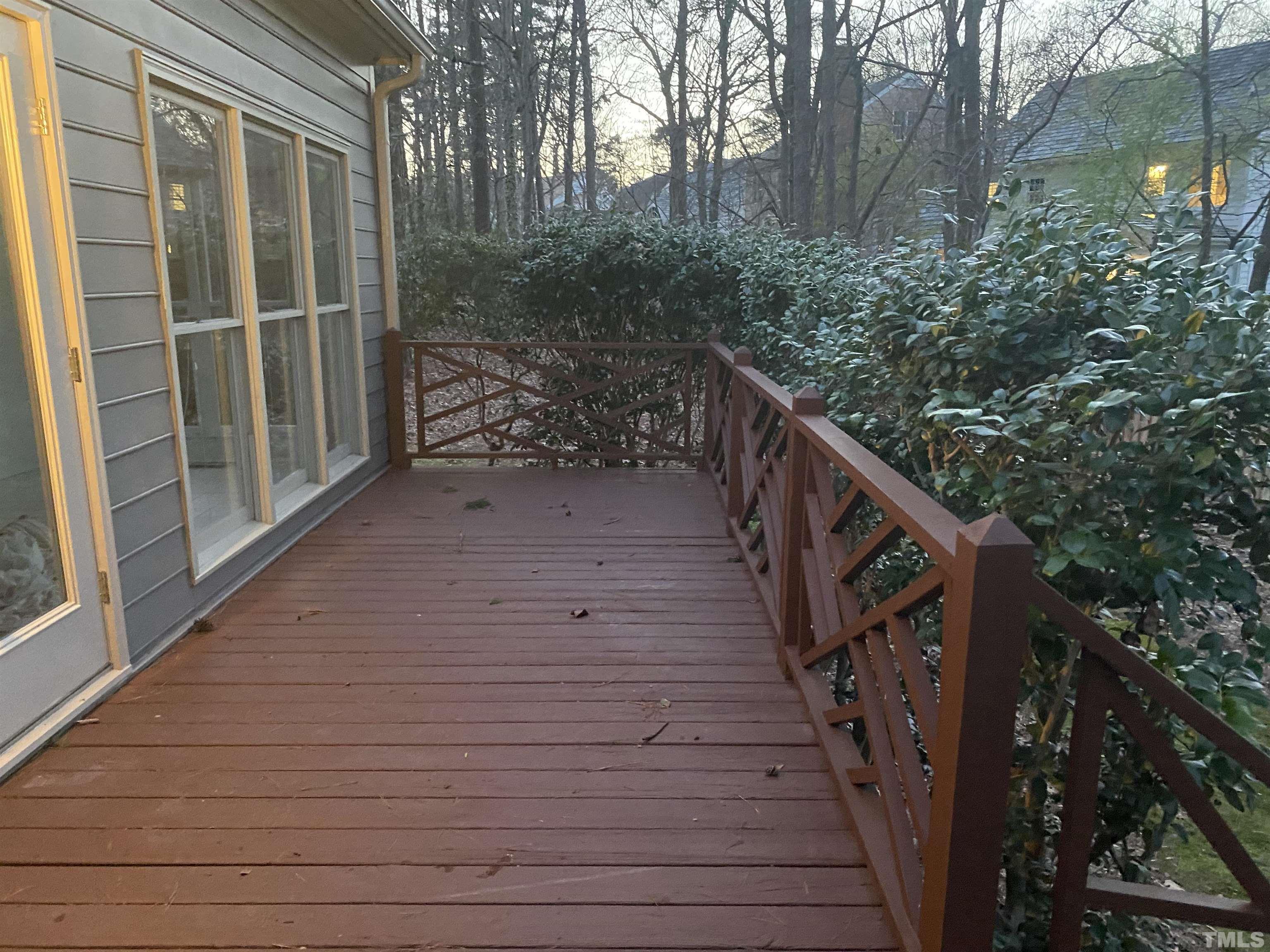 7949 Footman Way Raleigh, NC 27615 - Photo 7 of 28 a balcony with trees in front of it