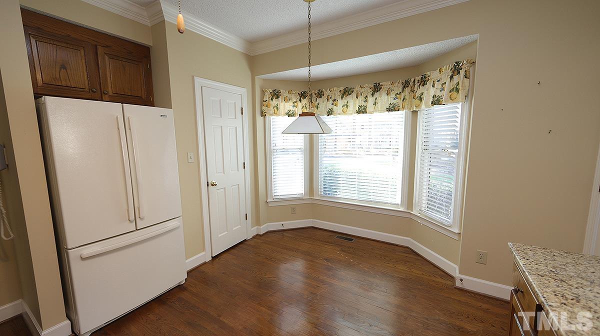 7949 Footman Way Raleigh, NC 27615 - Photo 10 of 28 a view of an empty room with a window