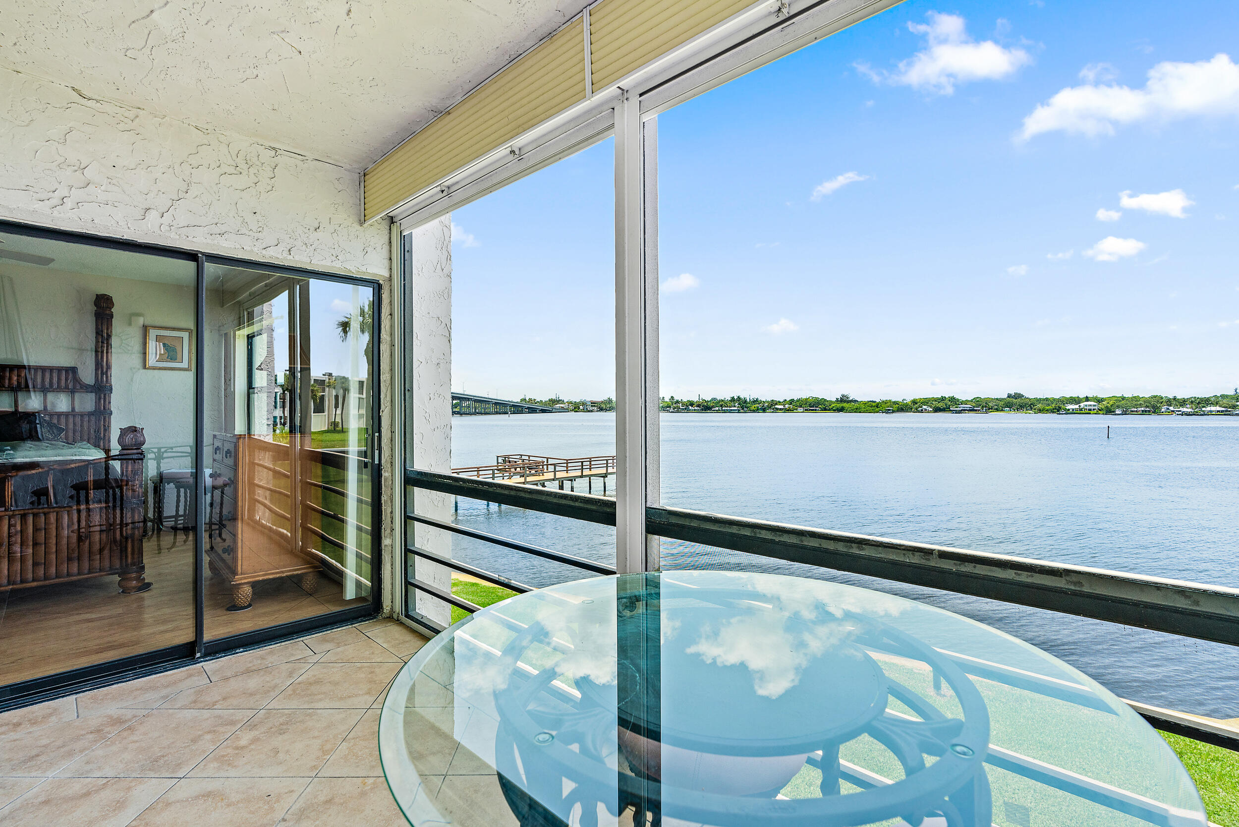 a view of a balcony with lake view and mountain view
