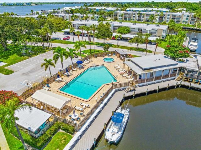 1950 Southwest Palm City Road, Unit 1202 Stuart, FL 34994 - Photo 18 of 21 an aerial view of a house with a big yard