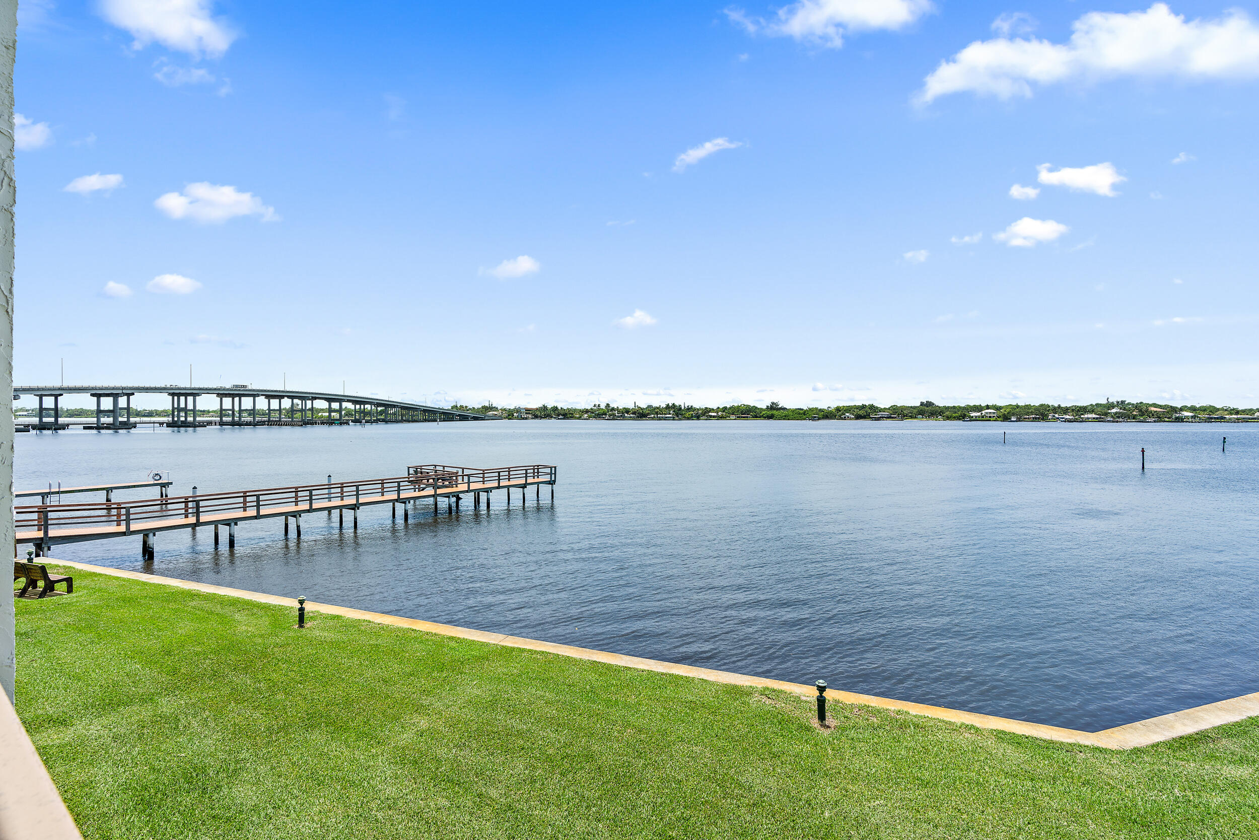 1950 Southwest Palm City Road, Unit 1202 Stuart, FL 34994 - Photo 8 of 21 a view of a lake with a big yard