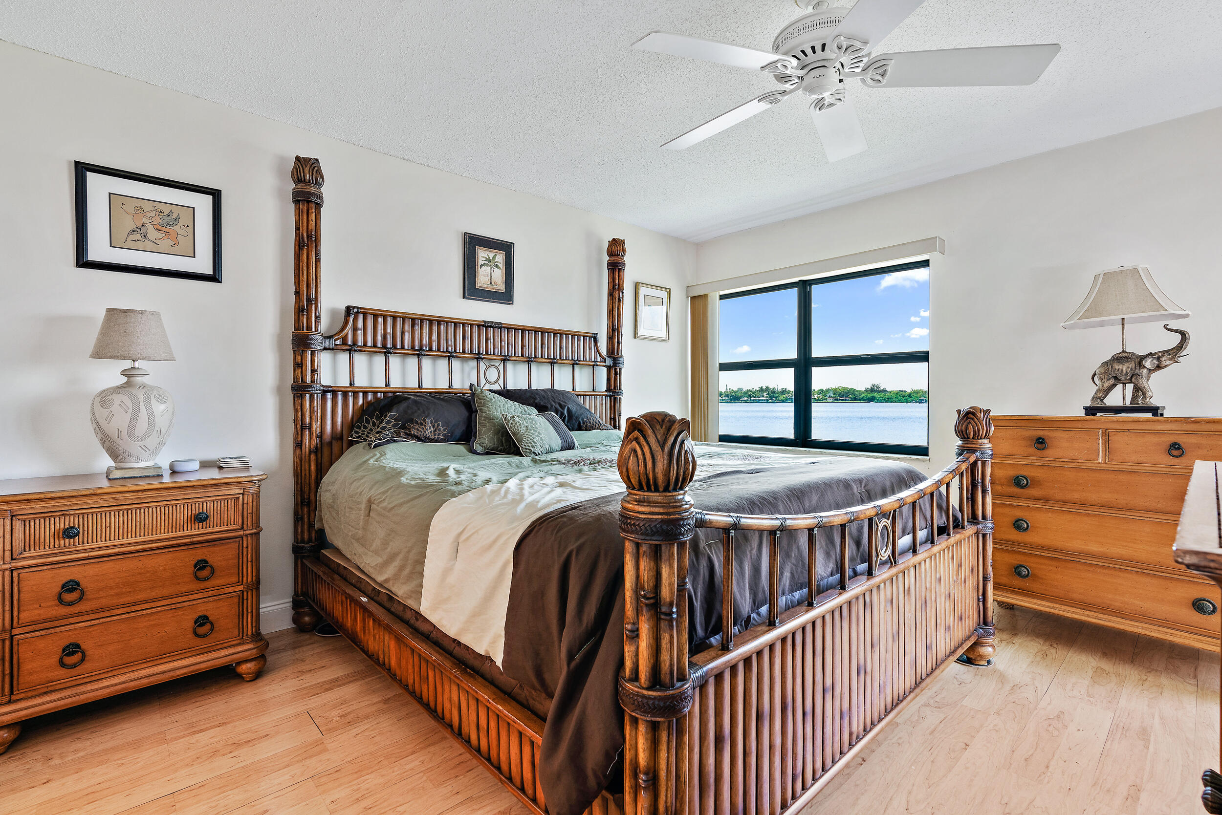 1950 Southwest Palm City Road, Unit 1202 Stuart, FL 34994 - Photo 10 of 21 a bedroom with bed and a window