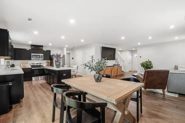 a view of a dining room with furniture