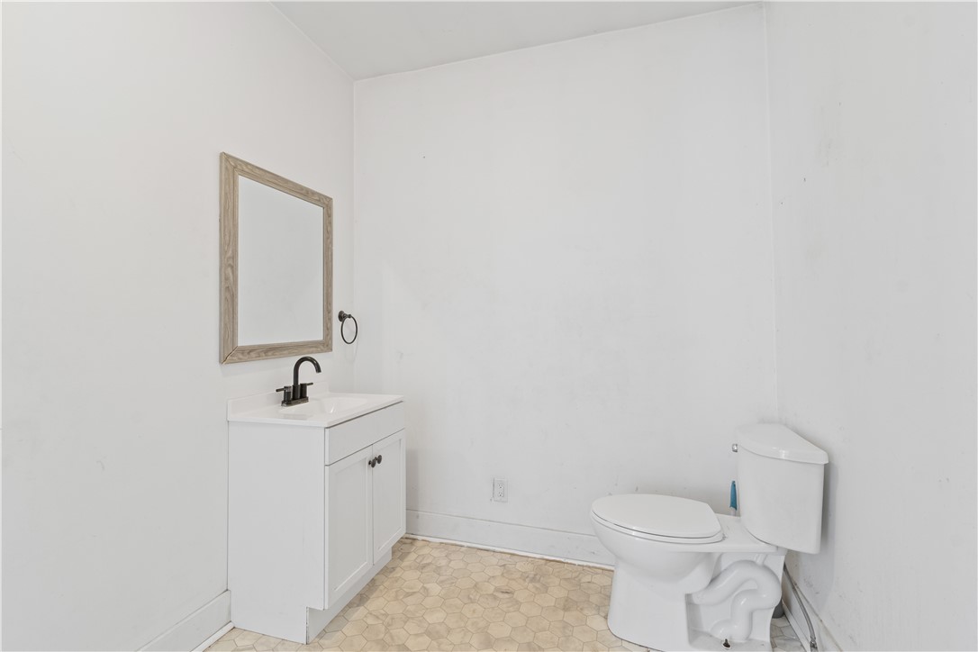 4351 Ridge Road Williamson, NY 14589 - Photo 16 of 30 FIRST FLOOR BATH/ LAUNDRY