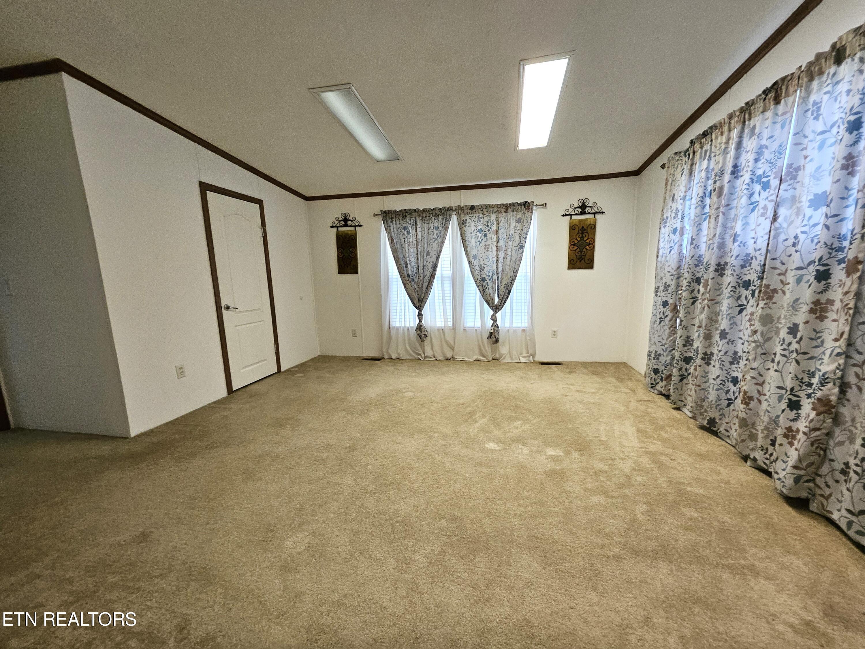 275 Ollis Road Oliver Springs, TN 37840 - Photo 8 of 26 Primary BR W/WI closet