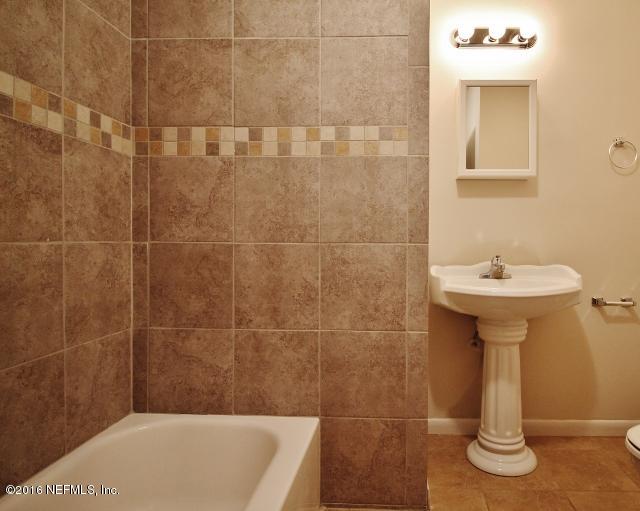 6328 Merrill Road Jacksonville, FL 32277 - Photo 9 of 10 a bathroom with a sink