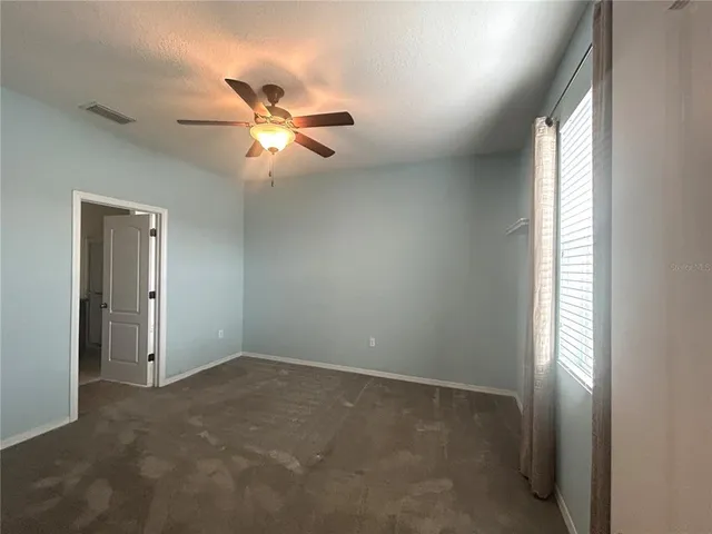 a view of a hallway with entryway