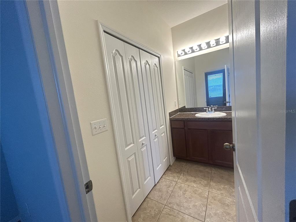 10702 Burning Bush Terrace Land O Lakes, FL 34638 - Photo 19 of 22 a view of a hallway with entryway