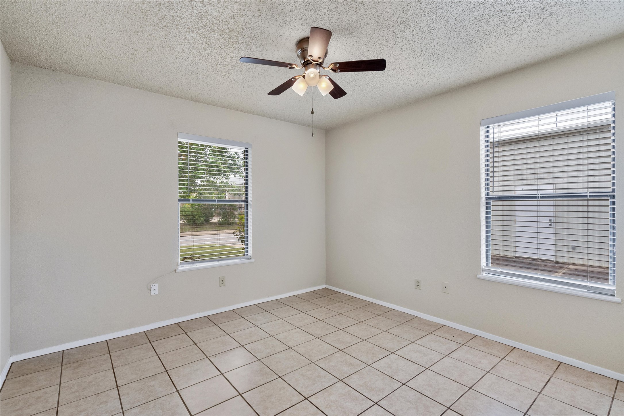 2805 Davis Street, Unit A Taylor, TX 76574 - Photo 7 of 12 a view of an empty room with a window
