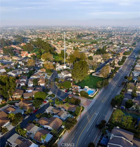 an aerial view of a city with lots of residential buildings